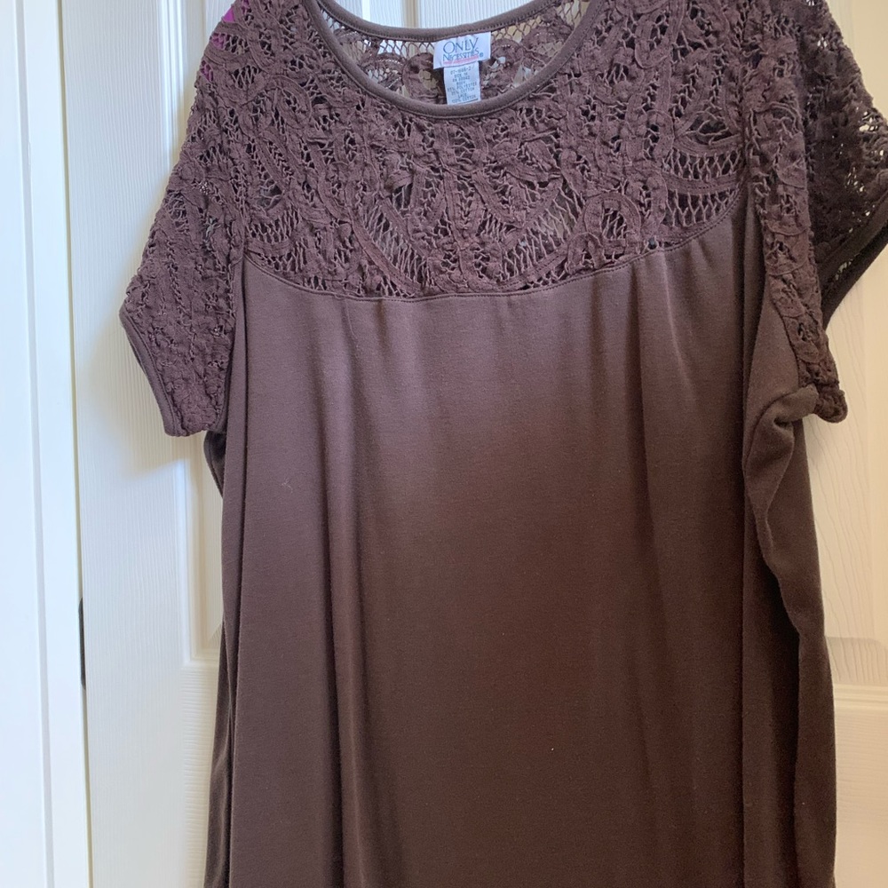 Top in delightful design.